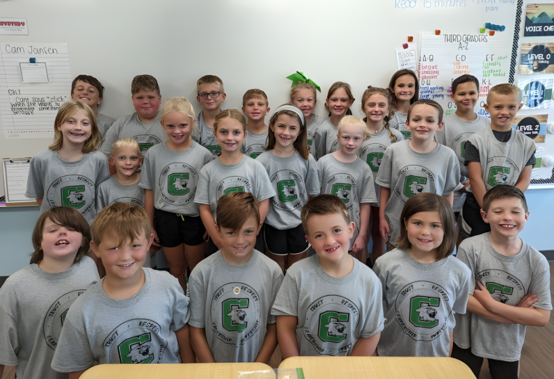 Group of kids wearing Crosby Elementary School shirts